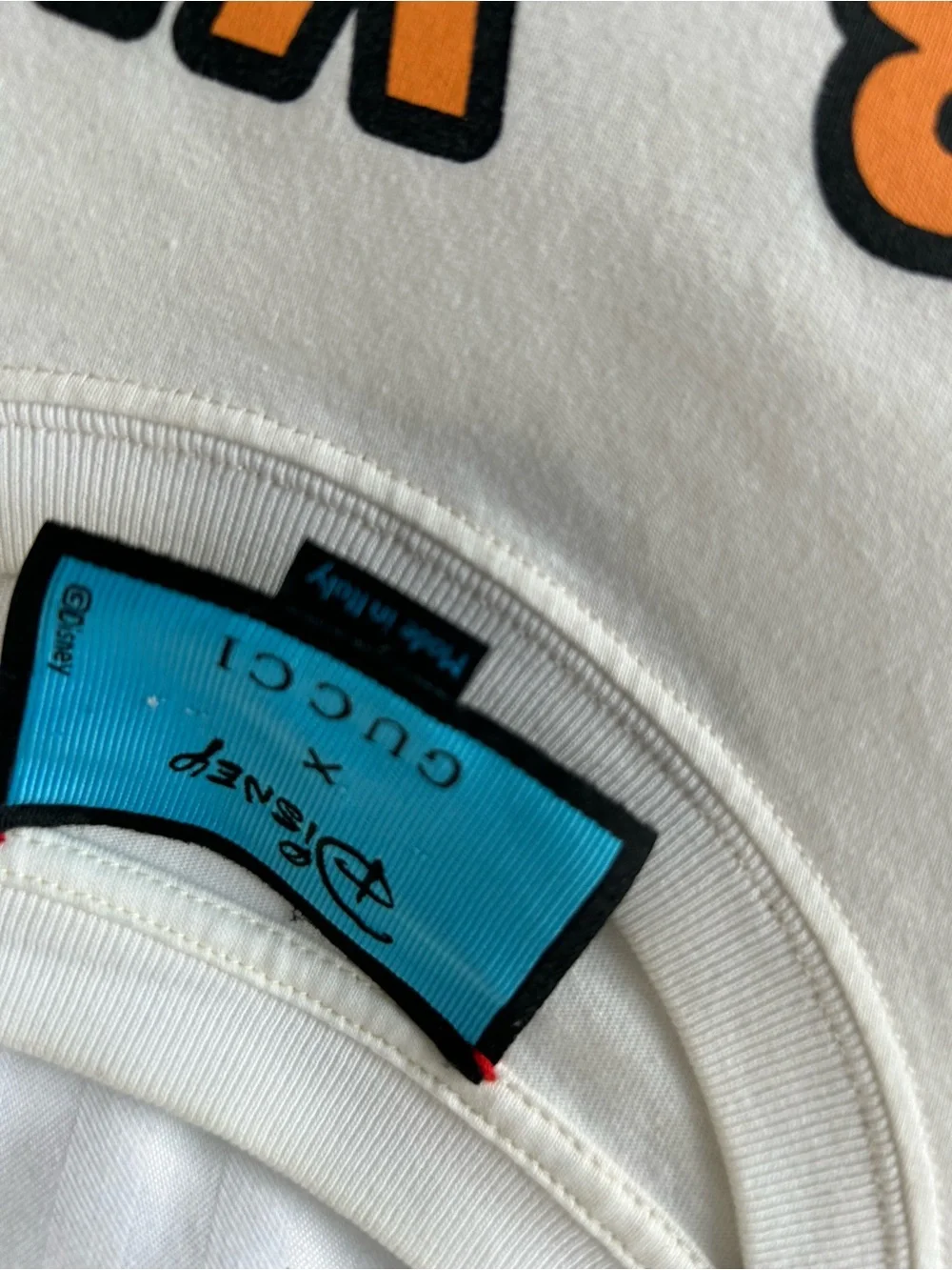 Graphic Cartoon Cowboy Tee in White with Orange & Blue Print